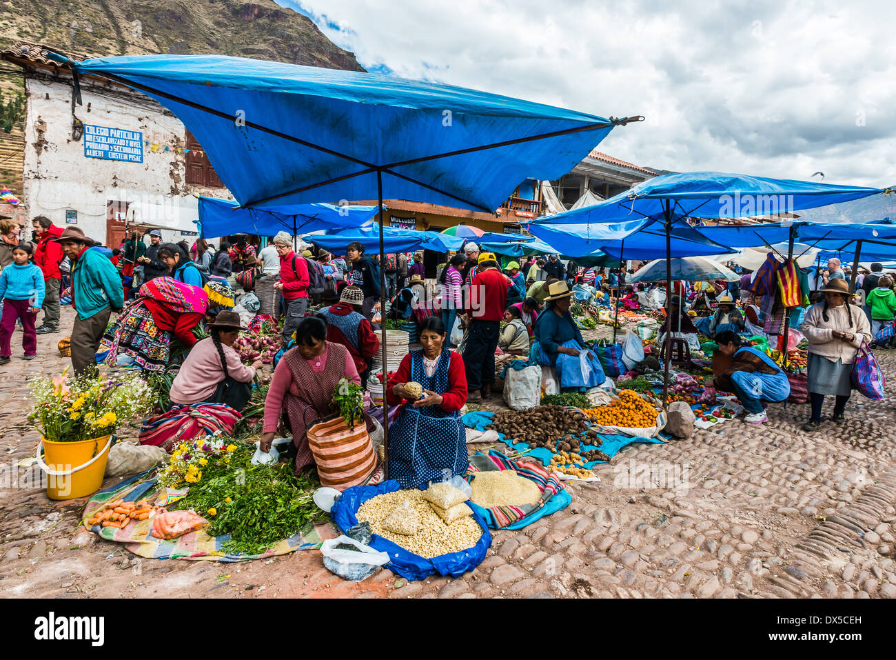 Pisac, Peru - July 14, 2013: people in the Pisac Market in the peruvian Andes at Pisac Peru on july 14th, 2013 Stock Photo