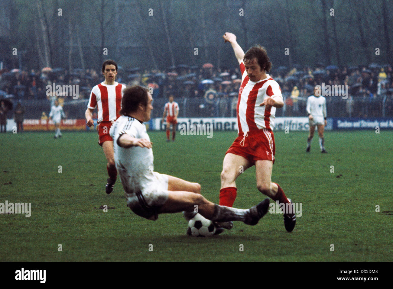 football, 2. Bundesliga Nord, 1974/1975, Lohrheide Stadium, SG Wattenscheid 09 versus Fortuna Cologne 0:0, scene of the match, Lothar Kobluhn (09) left and Peter Boers (Koeln) Stock Photo