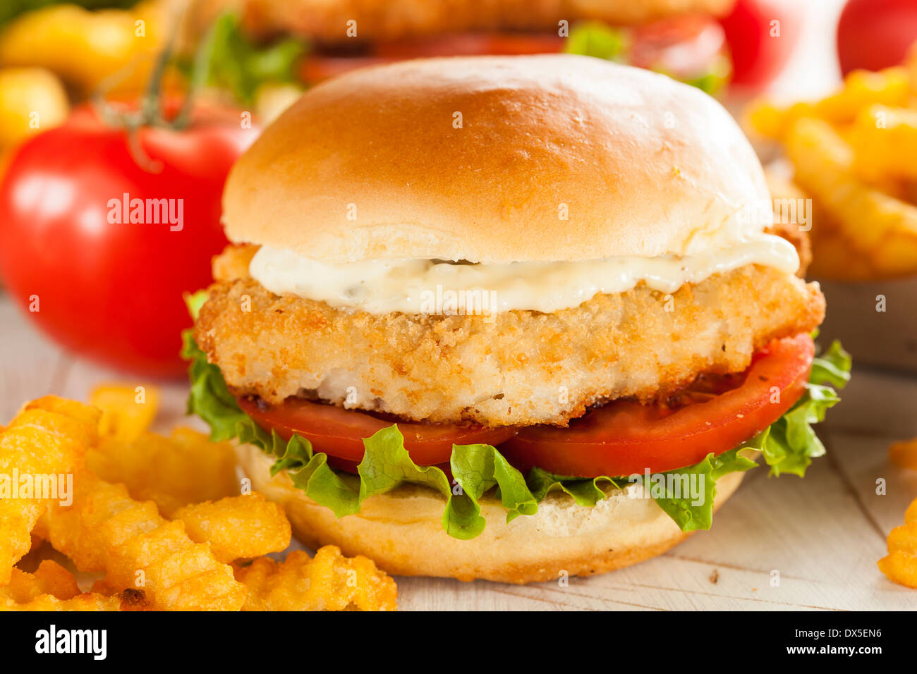 Breaded Fish Sandwich with Tartar Sauce and Fries Stock Photo Alamy
