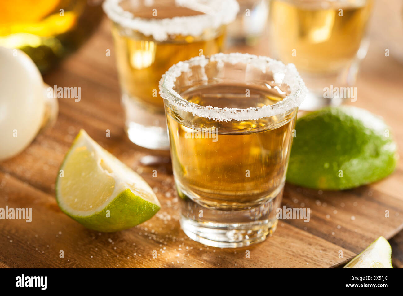 Tequila in Shot Glasses with Lime and Salt Stock Photo