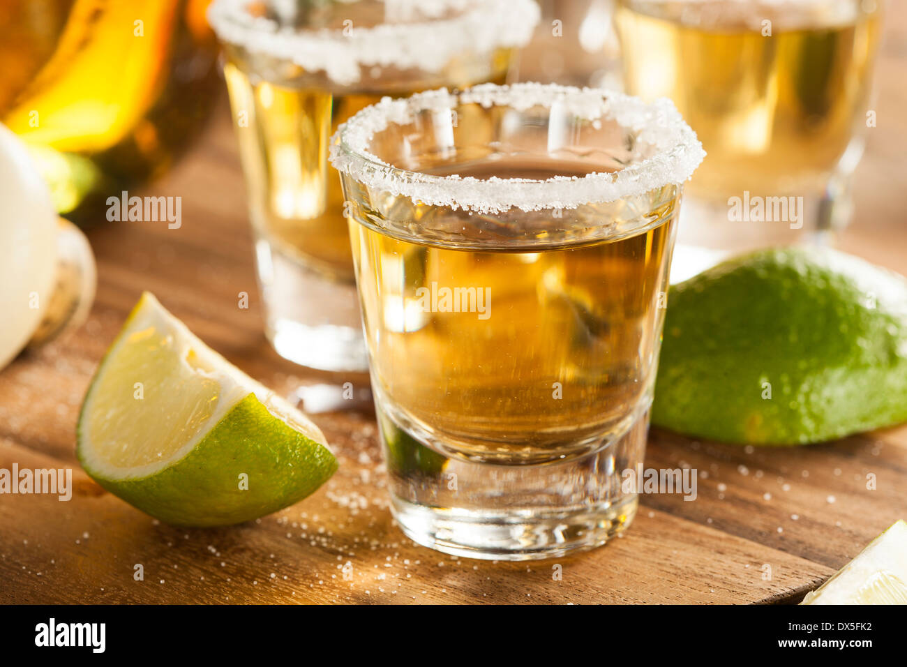 Tequila in Shot Glasses with Lime and Salt Stock Photo - Alamy