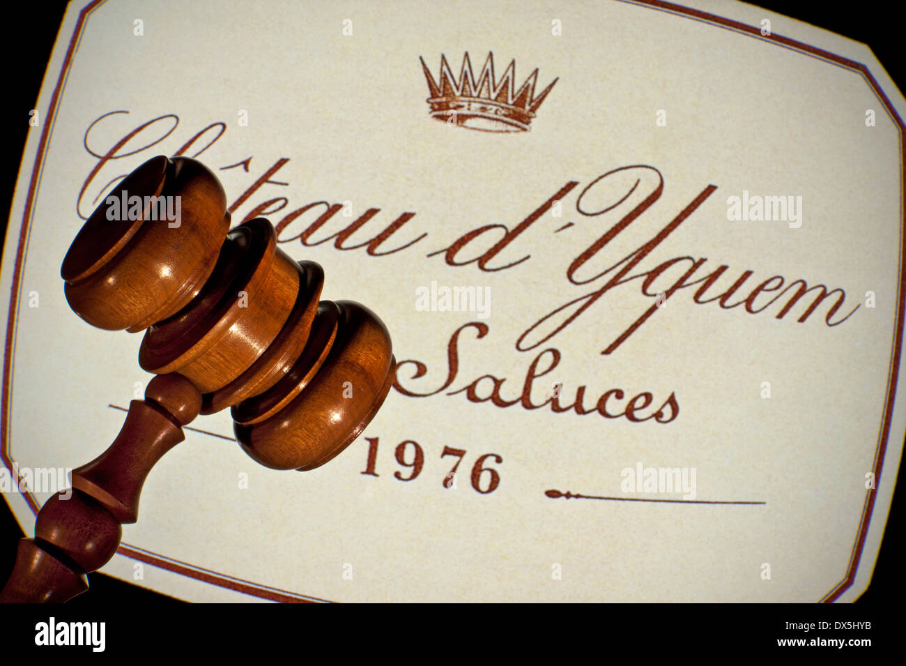 Old wooden auctioneers hammer on 1976 Chateau d'Yquem white wine label French Premier Cru Supérieur Sauternes Bordeaux France Stock Photo