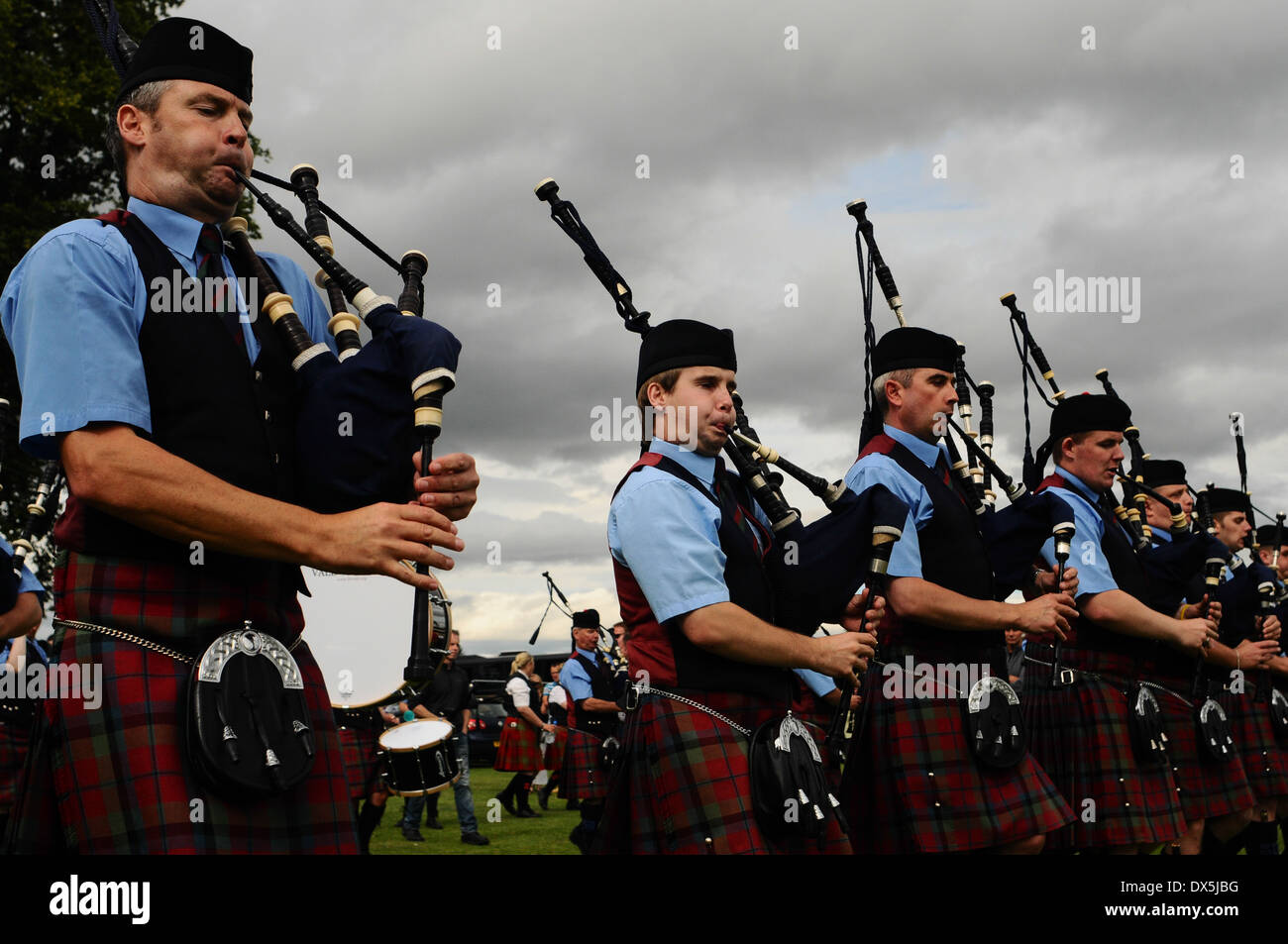 Pipe band competing at a Scottish Highland pipe band competition. The