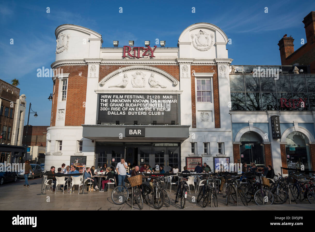 People in outdoor bar at Ritzy Cinema Brixton, London, UK Stock Photo