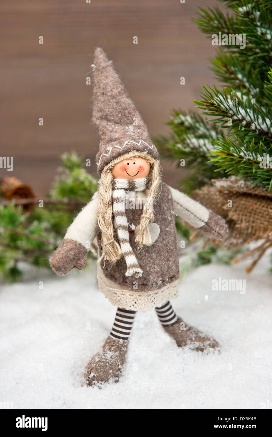 Happy girl enjoying winter holidays in snow. Nostalgic christmas background Stock Photo