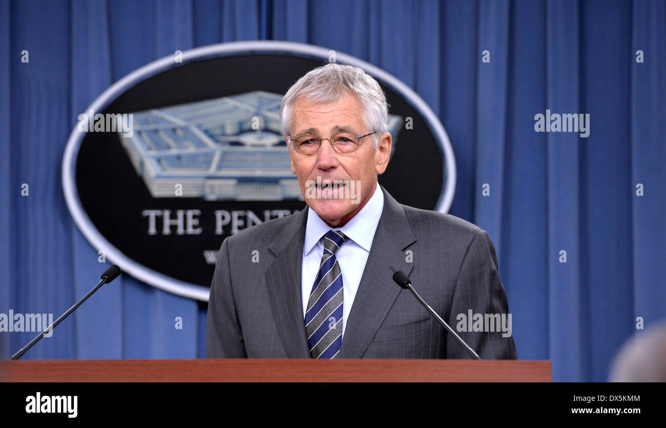 Washington, USA. 18th Mar, 2014. U.S. Defense Secretary Chuck Hagel makes brief remarks concerning security improvement plans and reviews on the Washington Navy Yard shooting last September at Pentagon in Washington, DC, capital of the United States, March 18, 2014. U.S. Defense Secretary Chuck Hagel and U.S. Navy Secretary Ray Mabus detailed steps to implement security changes following the Navy Yard shooting that left 12 people dead and several others wounded. Credit:  Bao Dandan/Xinhua/Alamy Live News Stock Photo