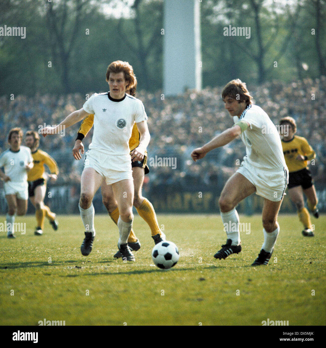 football, 2. Bundesliga Nord, 1975/1976, Lohrheide Stadium, SG Wattenscheid 09 versus Borussia Dortmund 2:1, scene of the match, Ewald Hammes (09) left and Rudi Klimke (09) Stock Photo