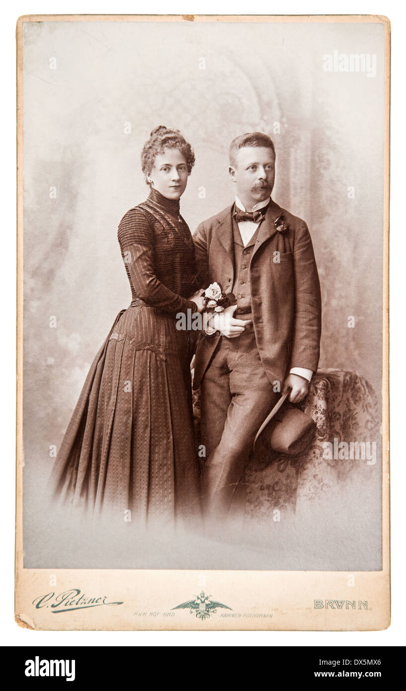 BERLIN, GERMANY - CIRCA 1880: antique family portrait man and woman wearing vintage clothing, circa 1880 in Berlin, Germany Stock Photo
