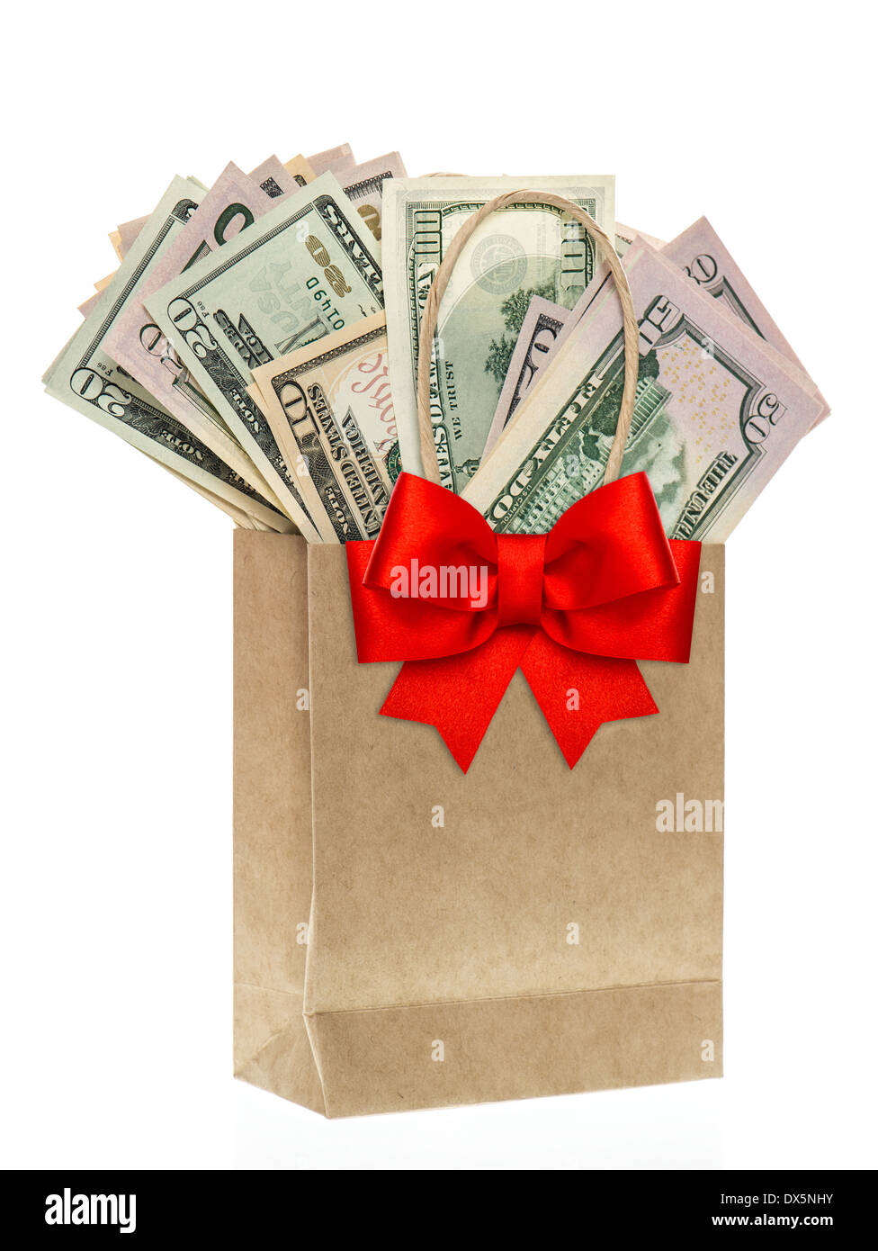 paper bag with american dollars and red ribon bow decoration. christmas shopping concept Stock Photo