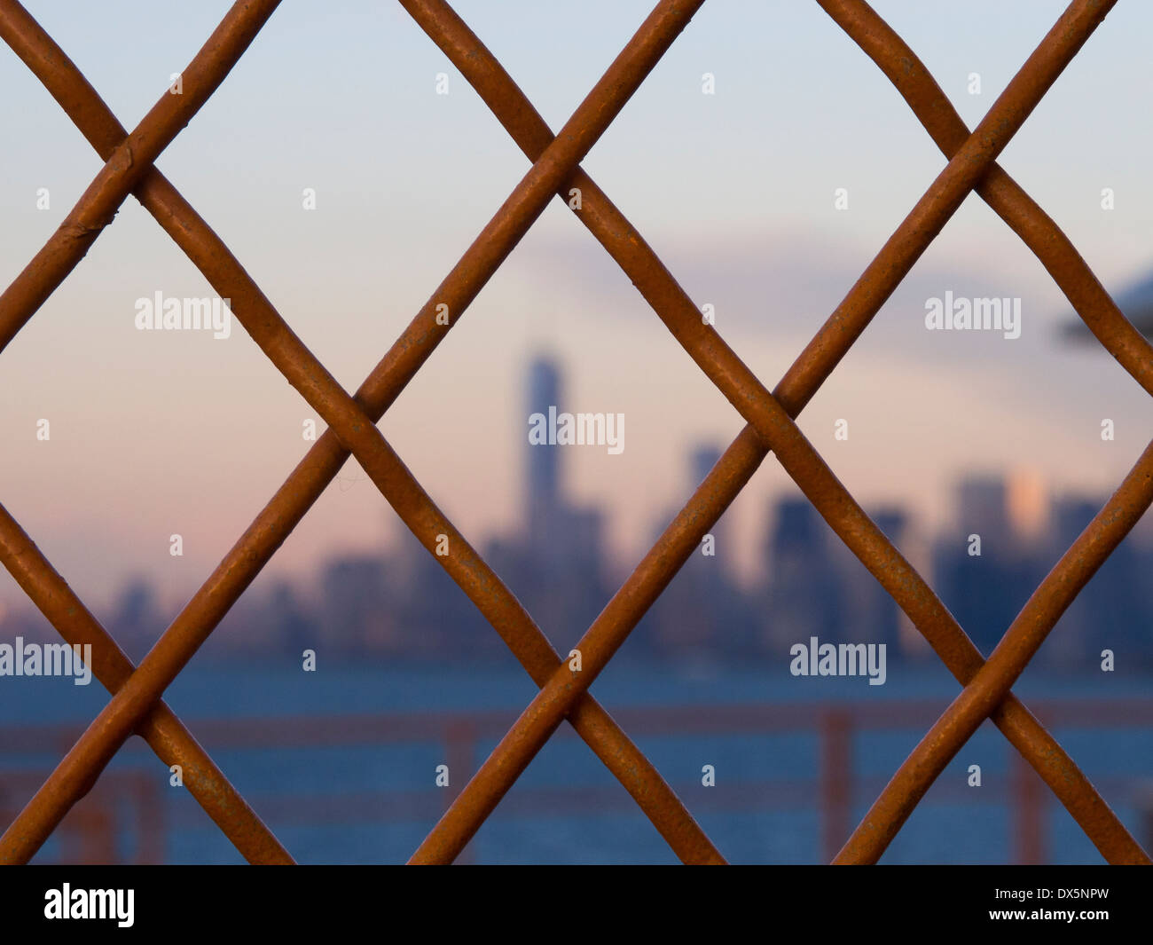 Manhattan Skyline and Wire Fence, New York Stock Photo