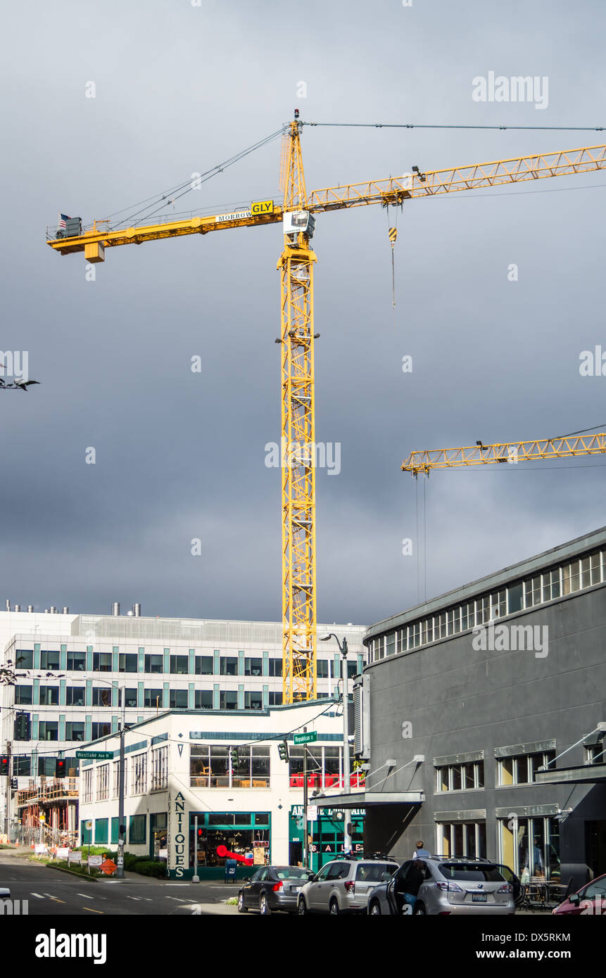 Tower cranes used in construction of high rise buildings.  Seattle Washington Stock Photo