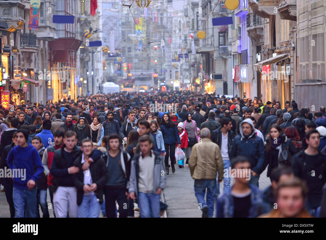ISTANBUL, TURKEY - JANUARY 12: People walking on Istiklal Street on January 12, 2014 in Istanbul, Turkey. Stock Photo