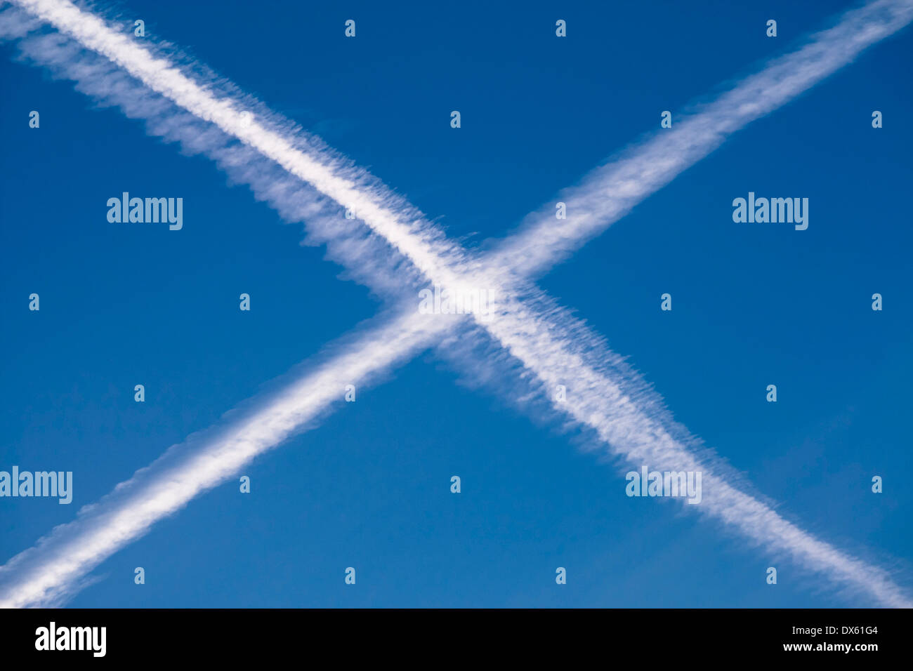 Sky trails in the shape of the Scottish flag or Saltire Stock Photo