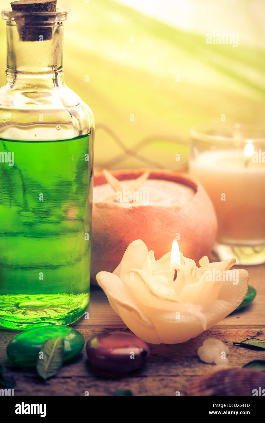 Oil massage with aromatic candles and stones Zen Stock Photo Alamy