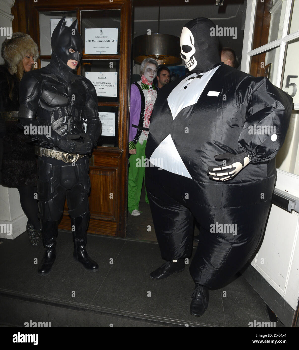 Liam Payne of One Direction dressed as Batman and Tom Daley in a fat  skeleton costume Celebrities at Funky Buddha nightclub for a Halloween  party London, England  Where: London, United