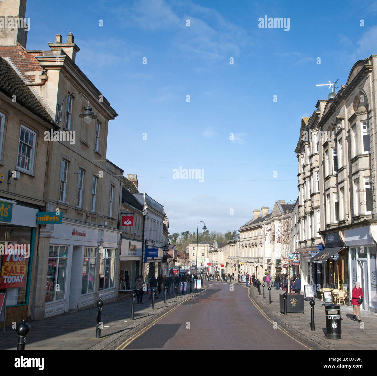 Shops and shoppers in the High Street of the town of Chippenham, Wiltshire, England Stock Photo
