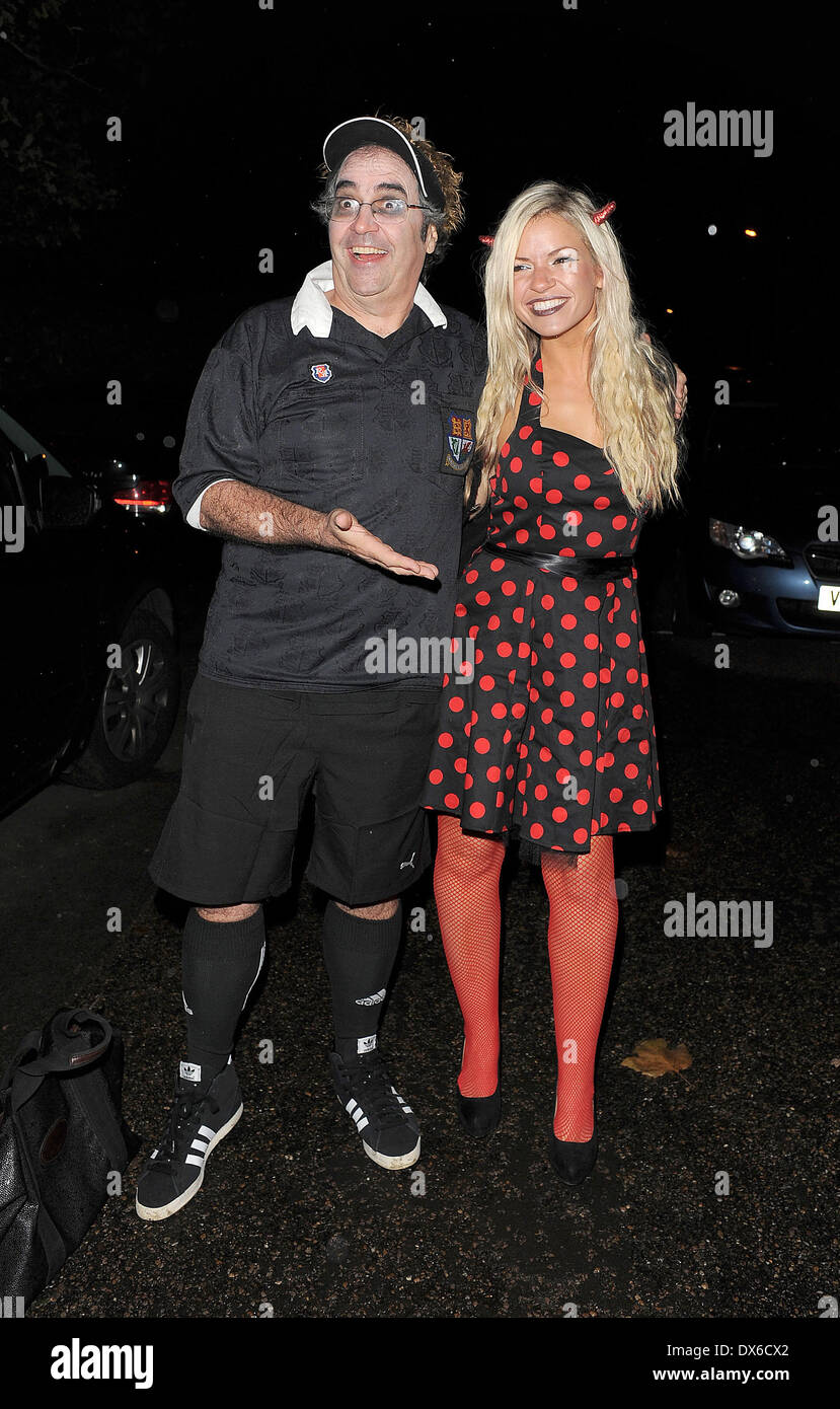 Danny Baker and his daughter leaving a Halloween party held at the home