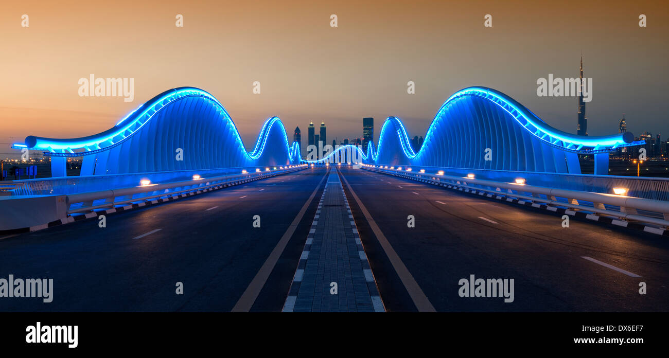 Modern architectural illuminated bridge at Meydan racecourse in Dubai