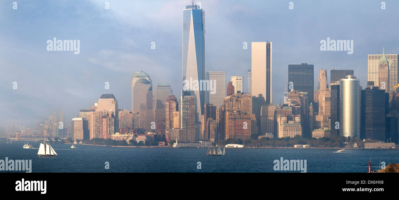 Panoramic view from Brooklyn Cruise Terminal across Governors Island towards Downtown Manhattan, New York Stock Photo