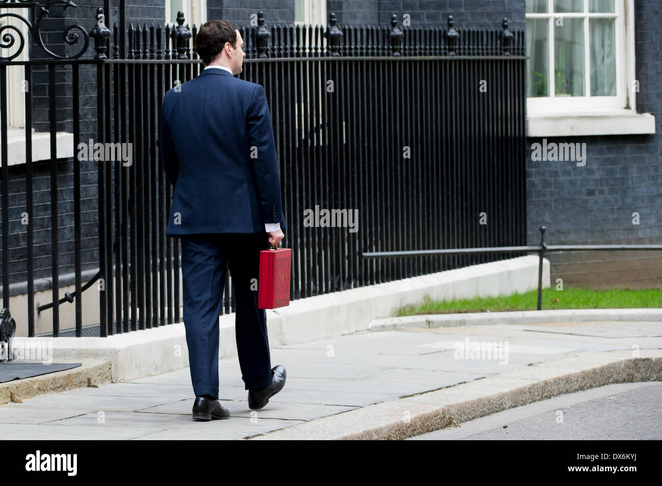 Chancellor of the Exchequer George Osborne outside 11 Downing Street before heading to the House of Commons to deliver his annua Stock Photo