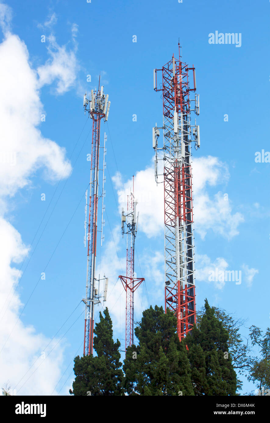 Communication tower radio mast signal and the sky dark. Stock Photo