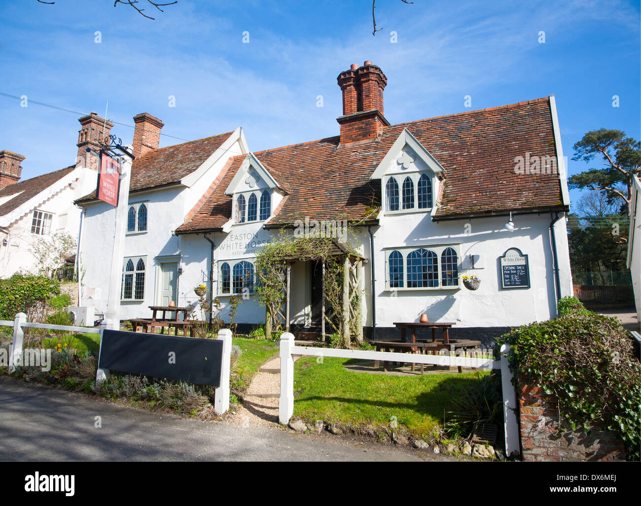 Historic white horse village pub building at easton hires stock