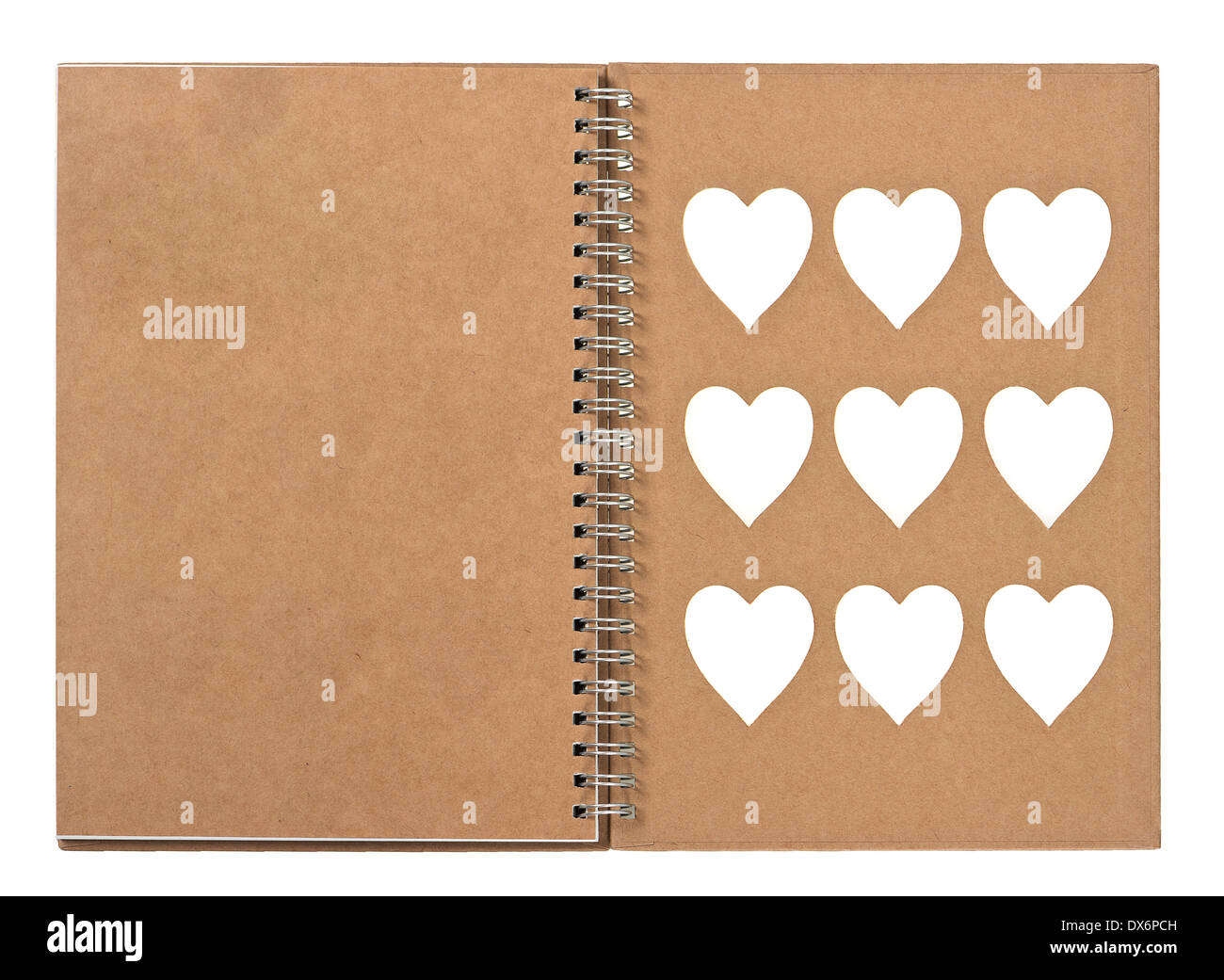 open note book with ring binder and white hearts on the cover. recycle paper Stock Photo