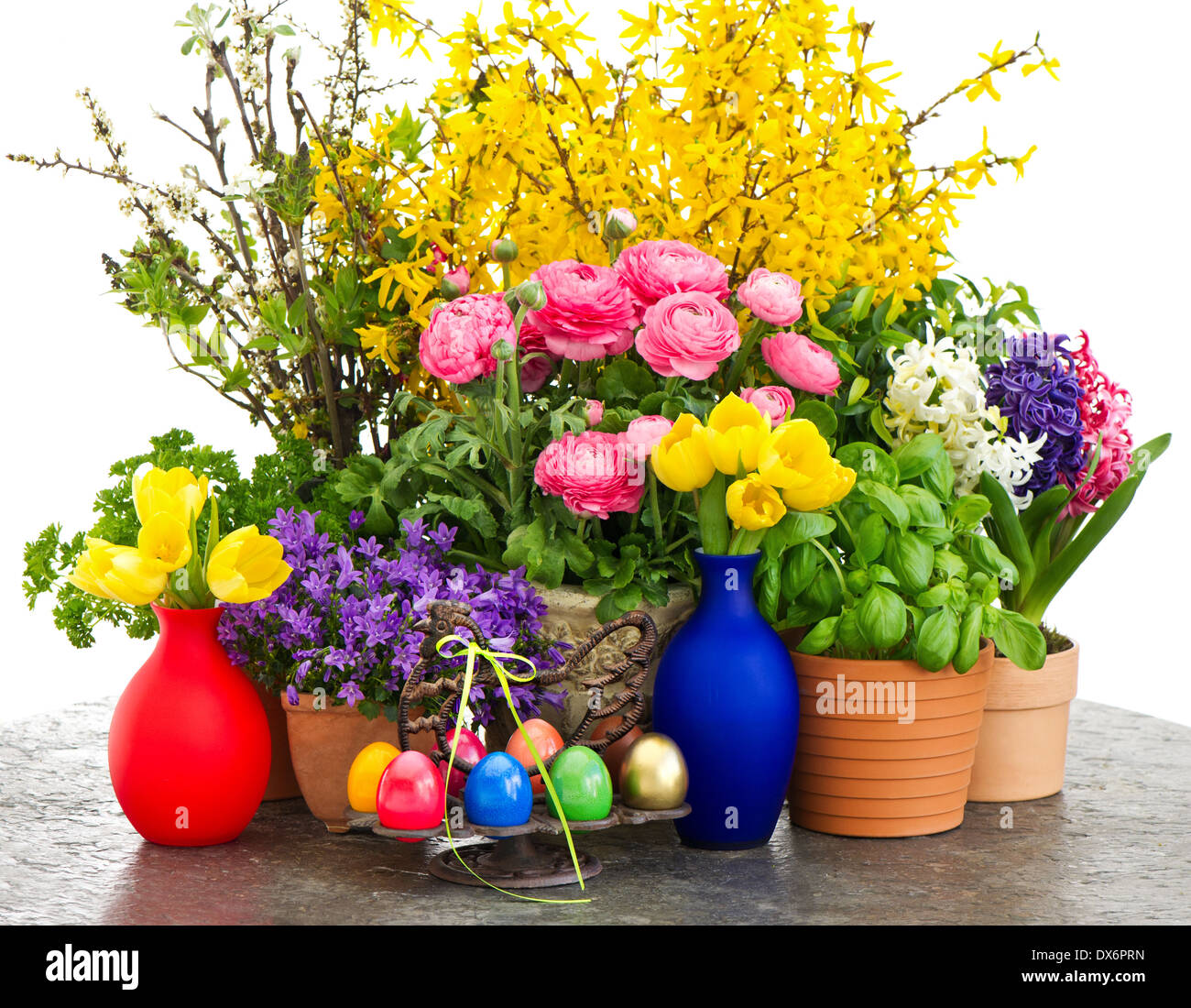 colorful composition with spring flowers and easter eggs decoration ...