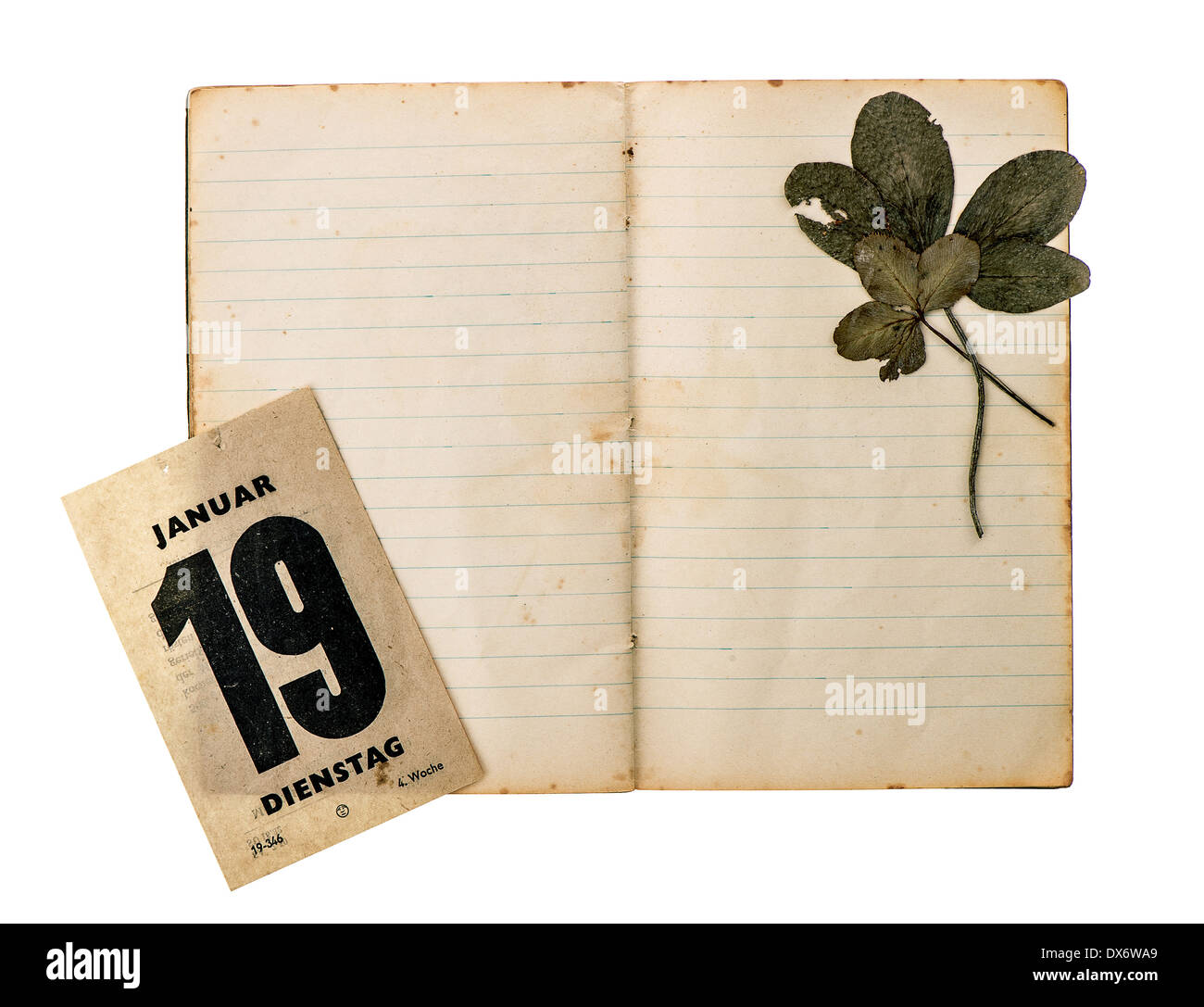 open old book with antique calendar page isolated on white background Stock Photo