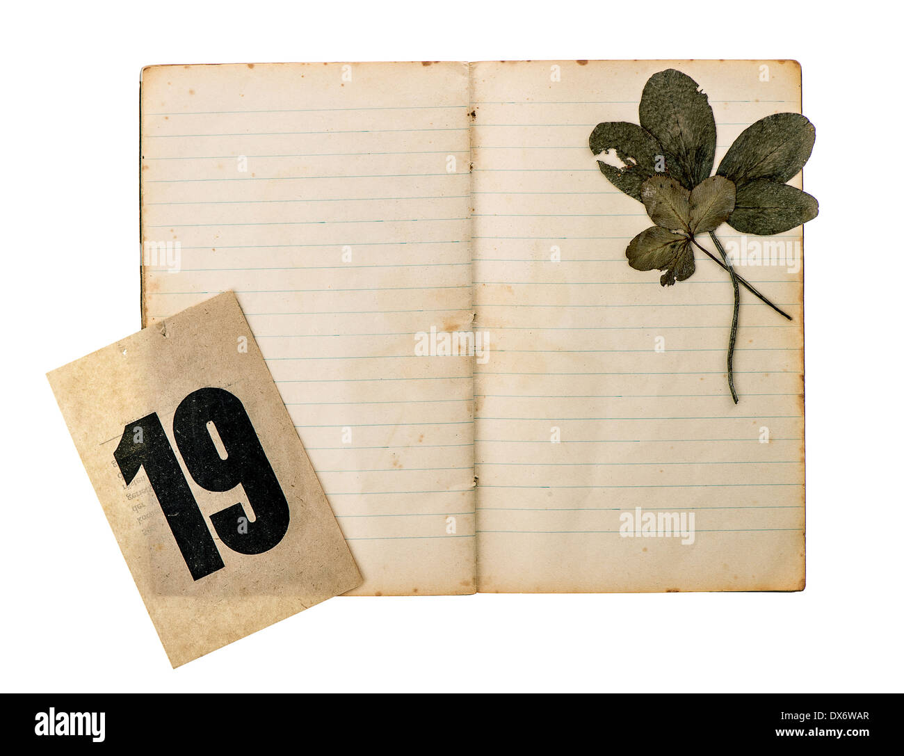 open old book with antique calendar page isolated on white background Stock Photo