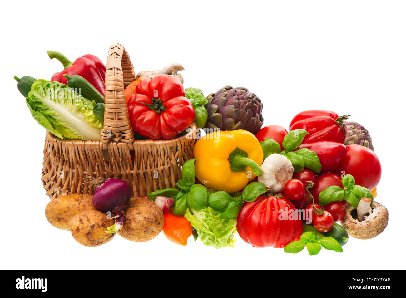 fresh vegetables and herbs on wooden background. organic diary products. shopping basket. food. healthy nutrition Stock Photo