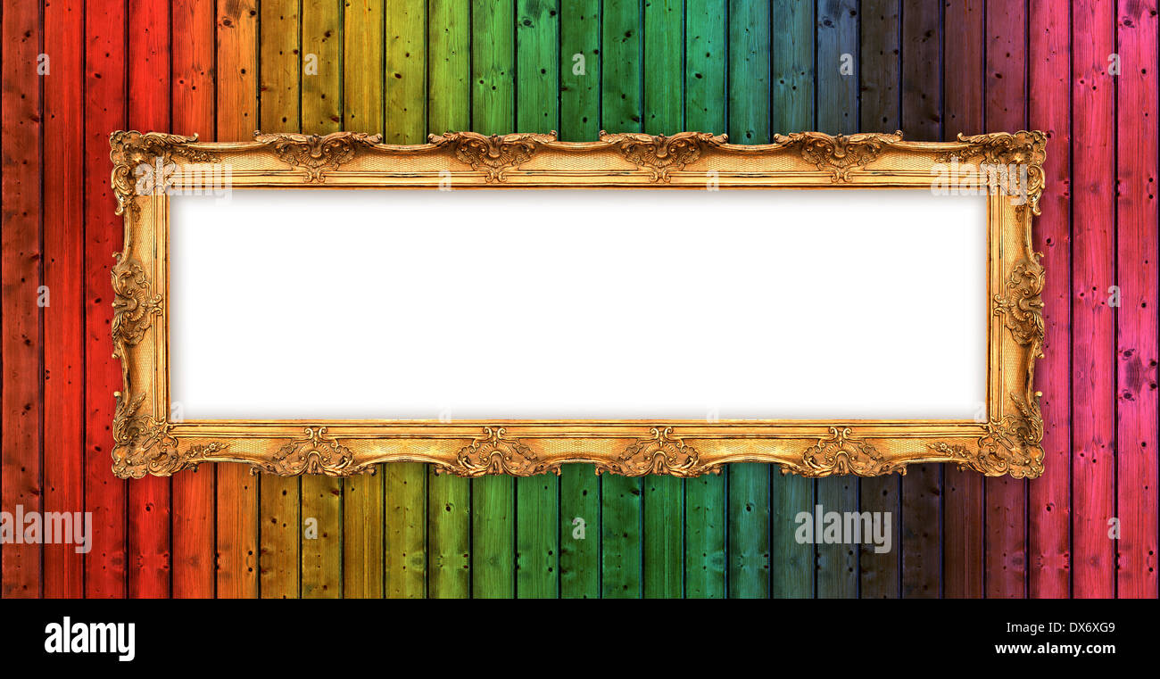 long old golden frame over colorful wooden wall. beautiful vintage background with empty space for your picture or text Stock Photo