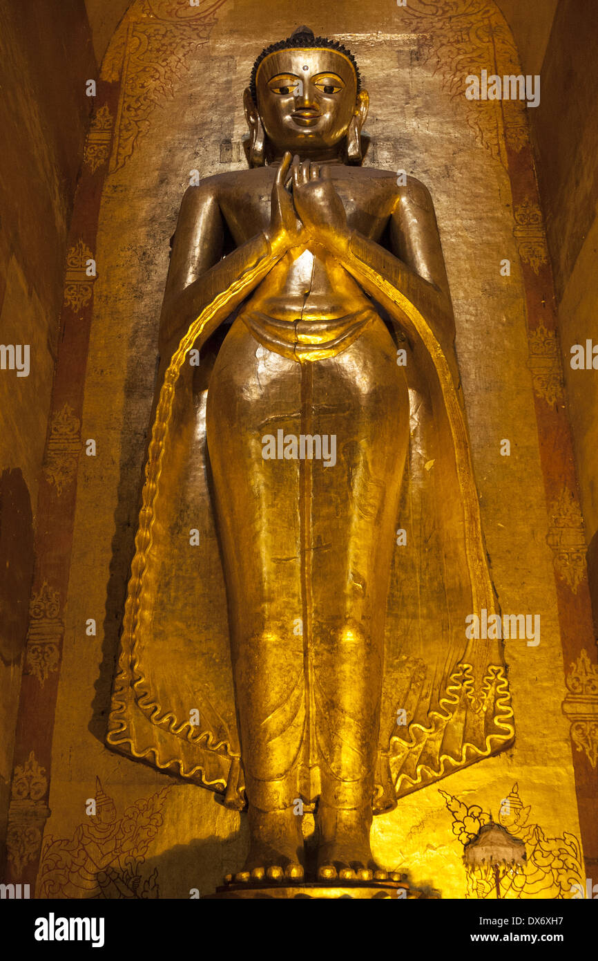 Large golden Kassapa Buddha inside Ananda Temple, Old Bagan, Bagan, Myanmar, (Burma) Stock Photo