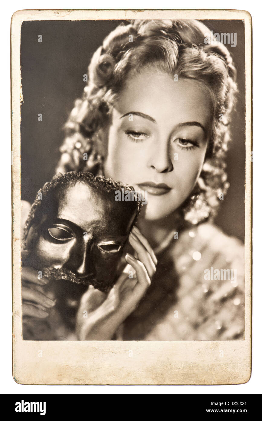BERLIN, GERMANY - CIRCA 1938: portrait of young woman with a carnival ...