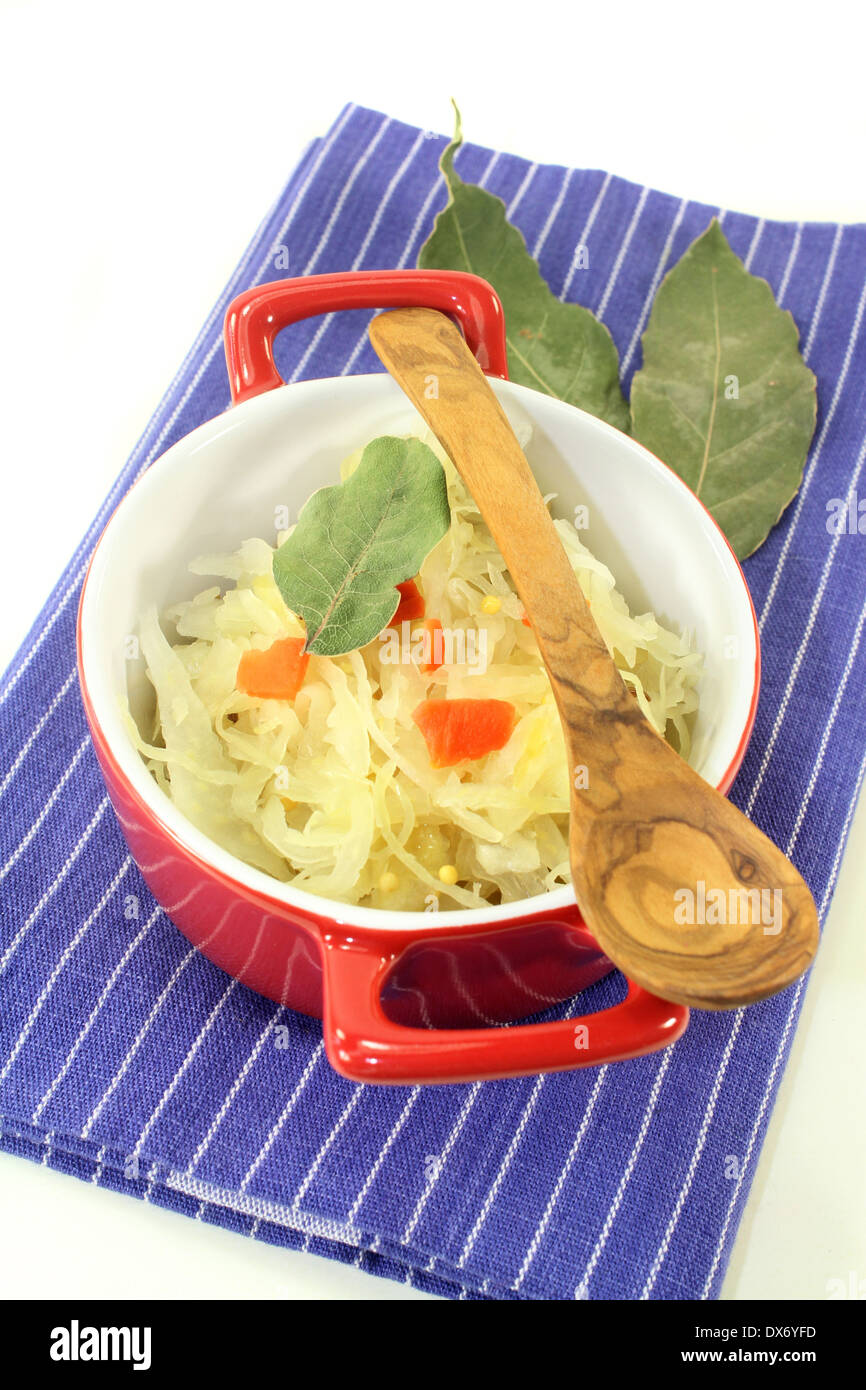 fresh cabbage with carrots and bay leaf Stock Photo