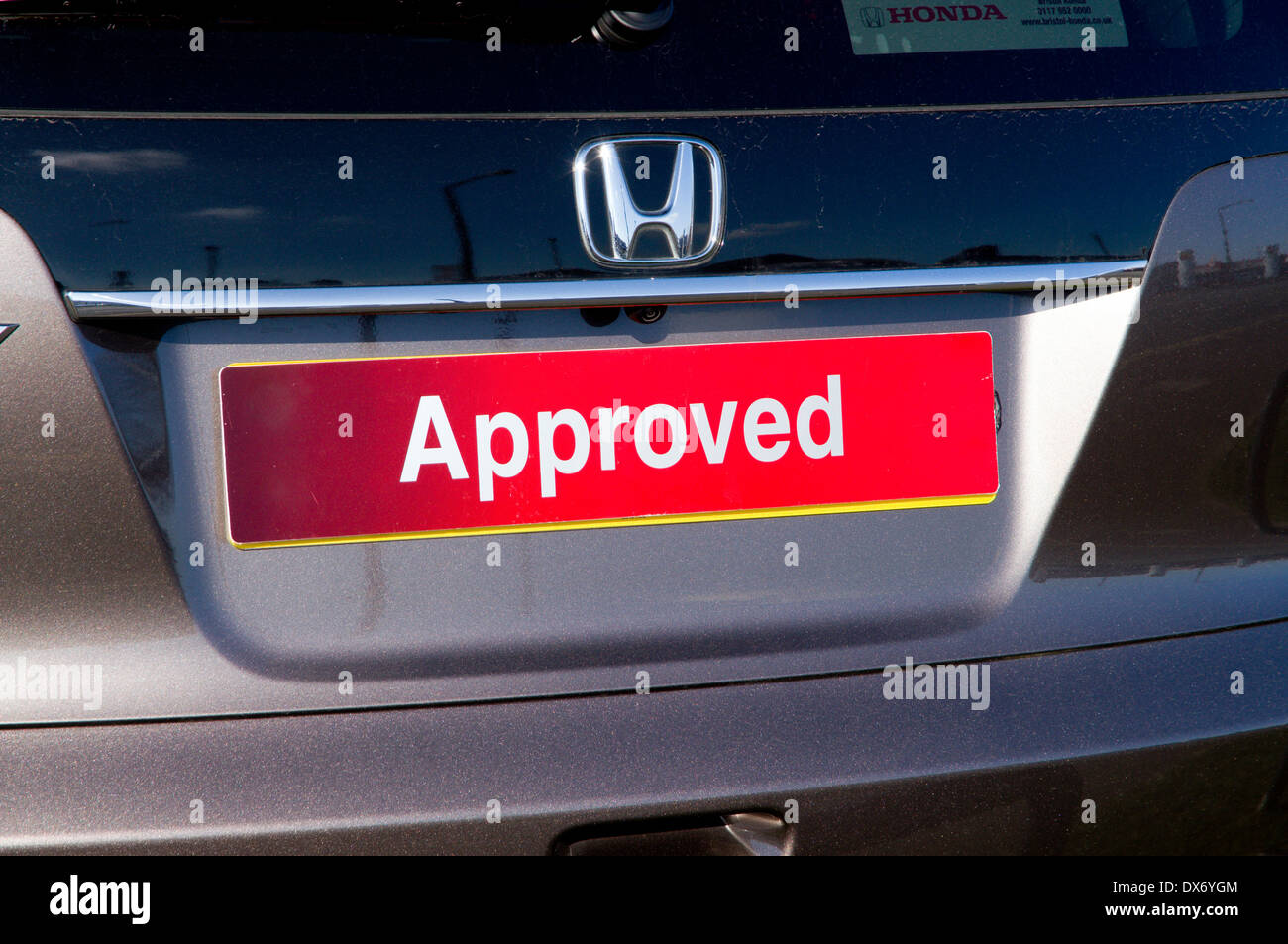 Car with the Word Approved on the numberplate. Stock Photo