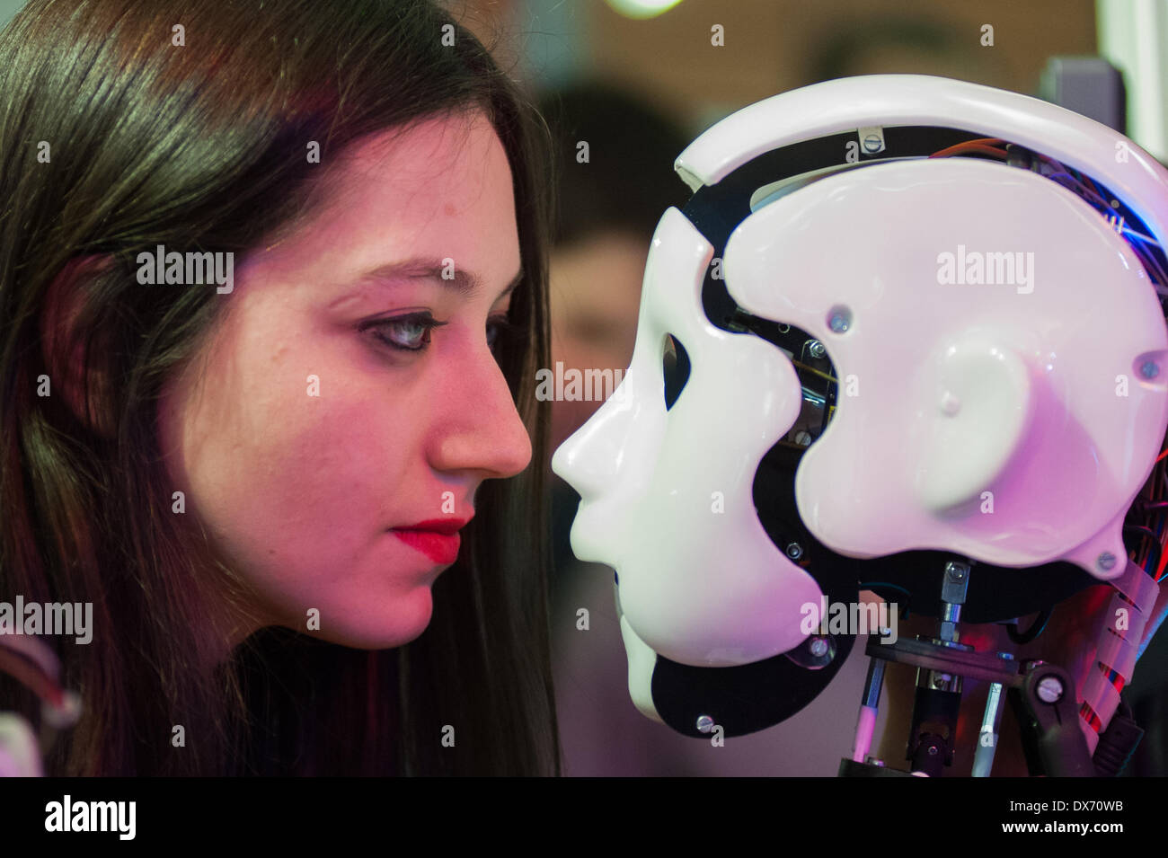Lyon, France - 19 March 2014: a woman looks at Jane by France Robotique at Innorobo 2014, the biggest fair in Europe for robotics. Credit:  Piero Cruciatti/Alamy Live News Stock Photo