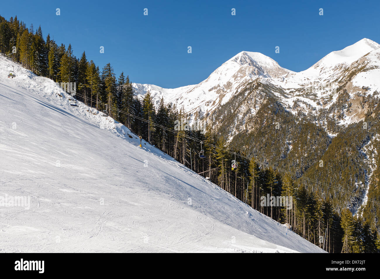 Mountain slope prepared for downhill skiing Stock Photo