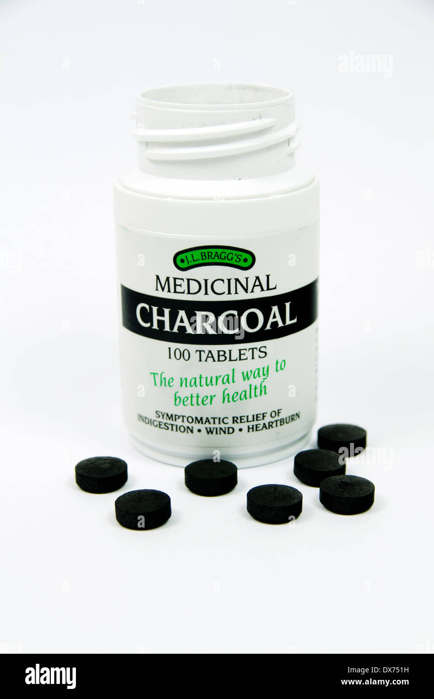 Bottle of Medicinal Charcoal tablets. Stock Photo