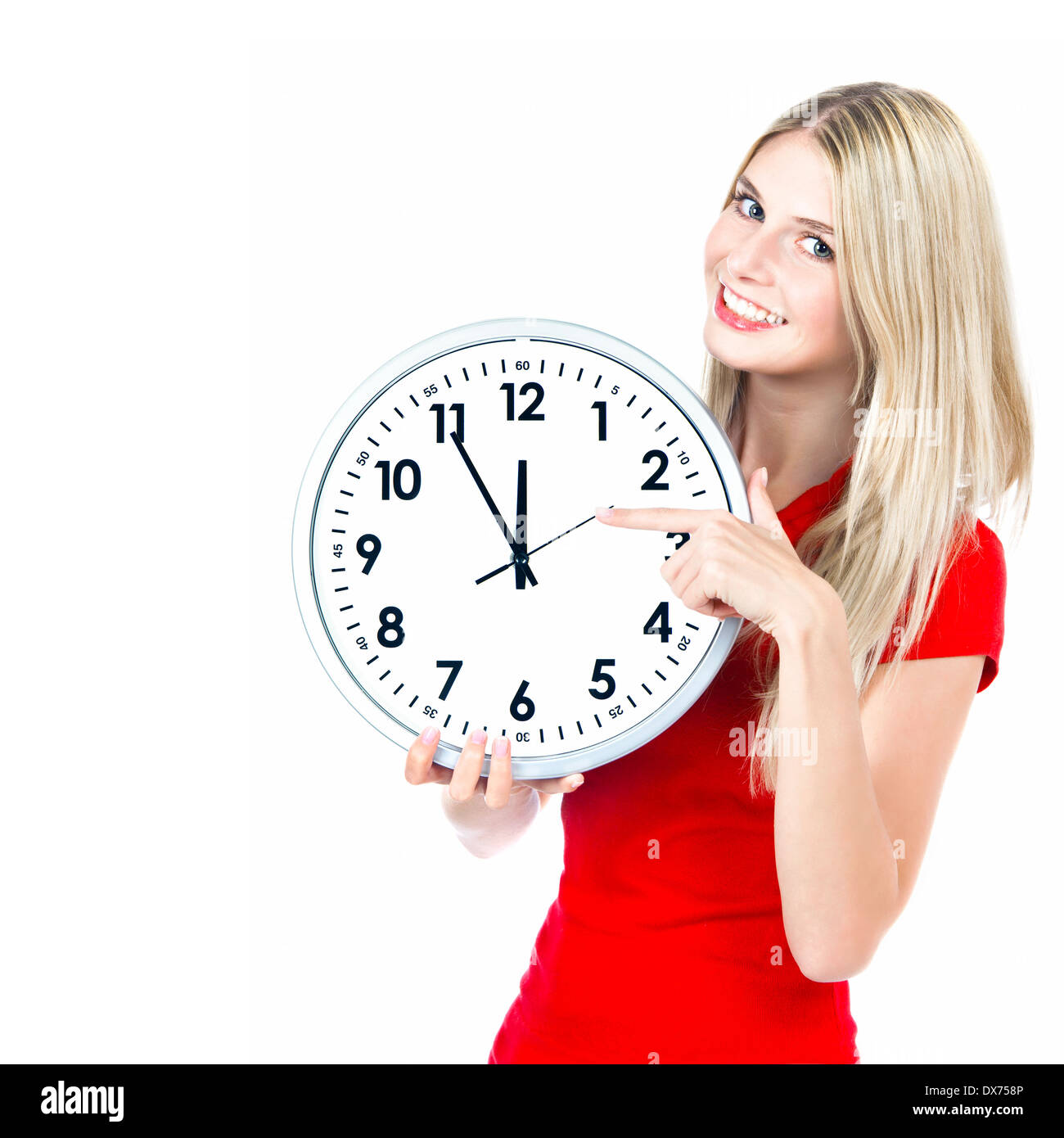 time concept. five to twelve. young beautiful woman with big clock on white background Stock Photo