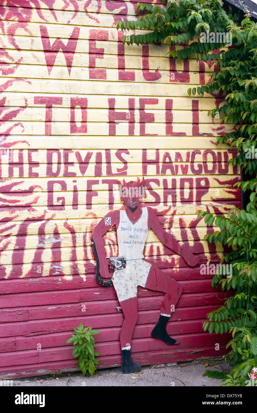 Hell Hangout Gift shop on Grand Cayman with Devil effigy Stock Photo