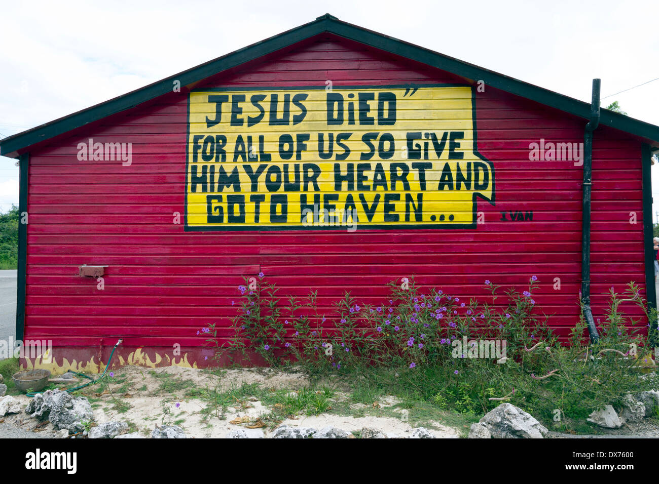 Religious quotation on the rear wall of the Hell Hangout Gift Shop on Grand Cayman Stock Photo