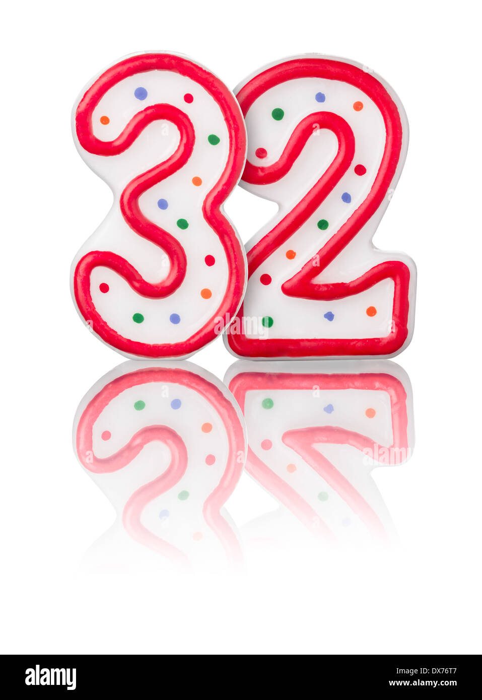 Red number 32 with reflection on a white background Stock Photo