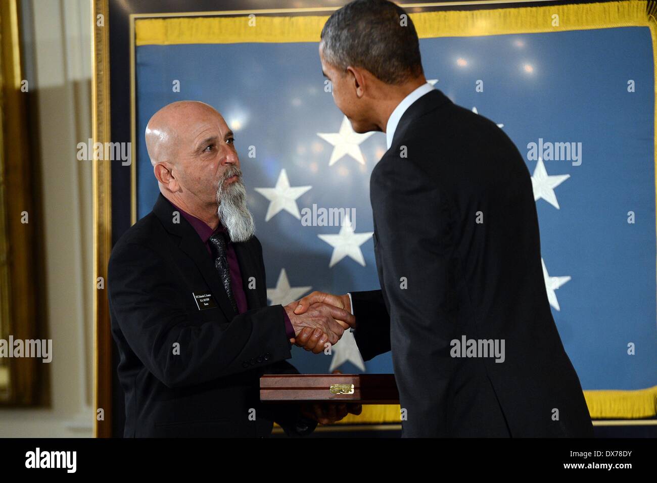 US President Barack Obama presents the Medal of Honor to Pete Corrall ...