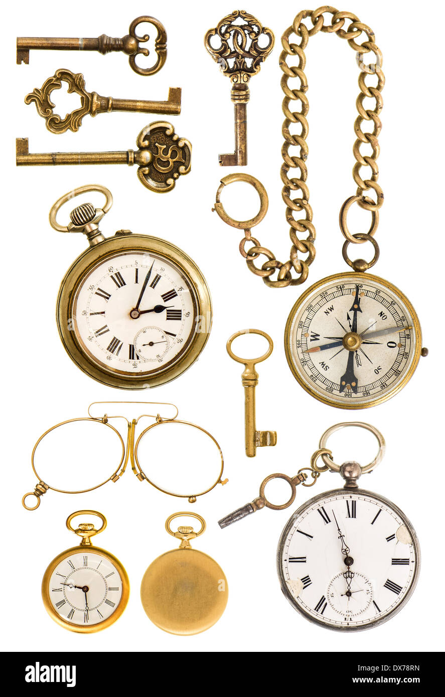 collection of golden vintage accessories. antique keys, clock, compass, glasses isolated on white background Stock Photo