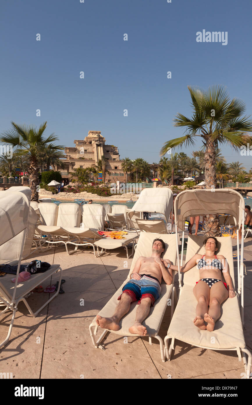 Couple on holiday, Dubai - Aquaventure waterpark, Atlantis Hotel, the Palm, Dubai, UAE, United Arab Emirates Middle East Stock Photo