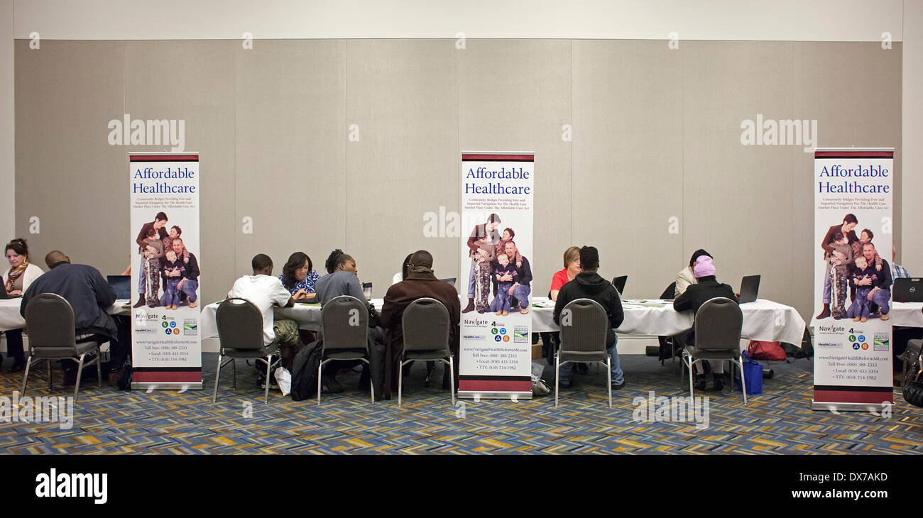 Detroit, Michigan - Health care 'navigators' sign people up for health insurance plans under the Affordable Care Act. © Jim West/Alamy Live News Stock Photo
