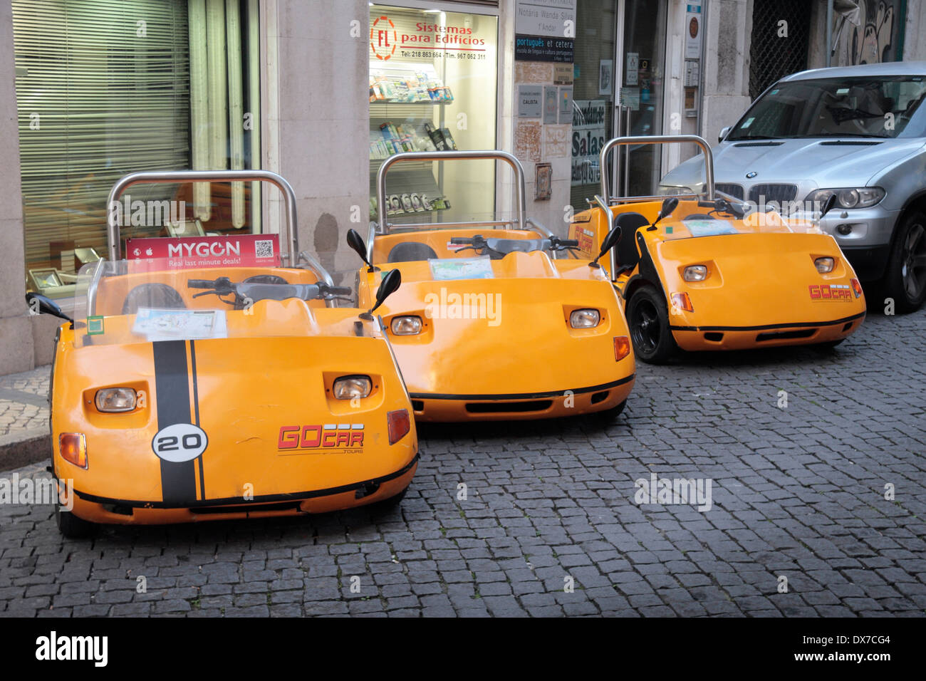 GoCar Tours, a funny looking three wheel car for hire by tourists in Lisbon, (Lisboa), Portugal. Stock Photo