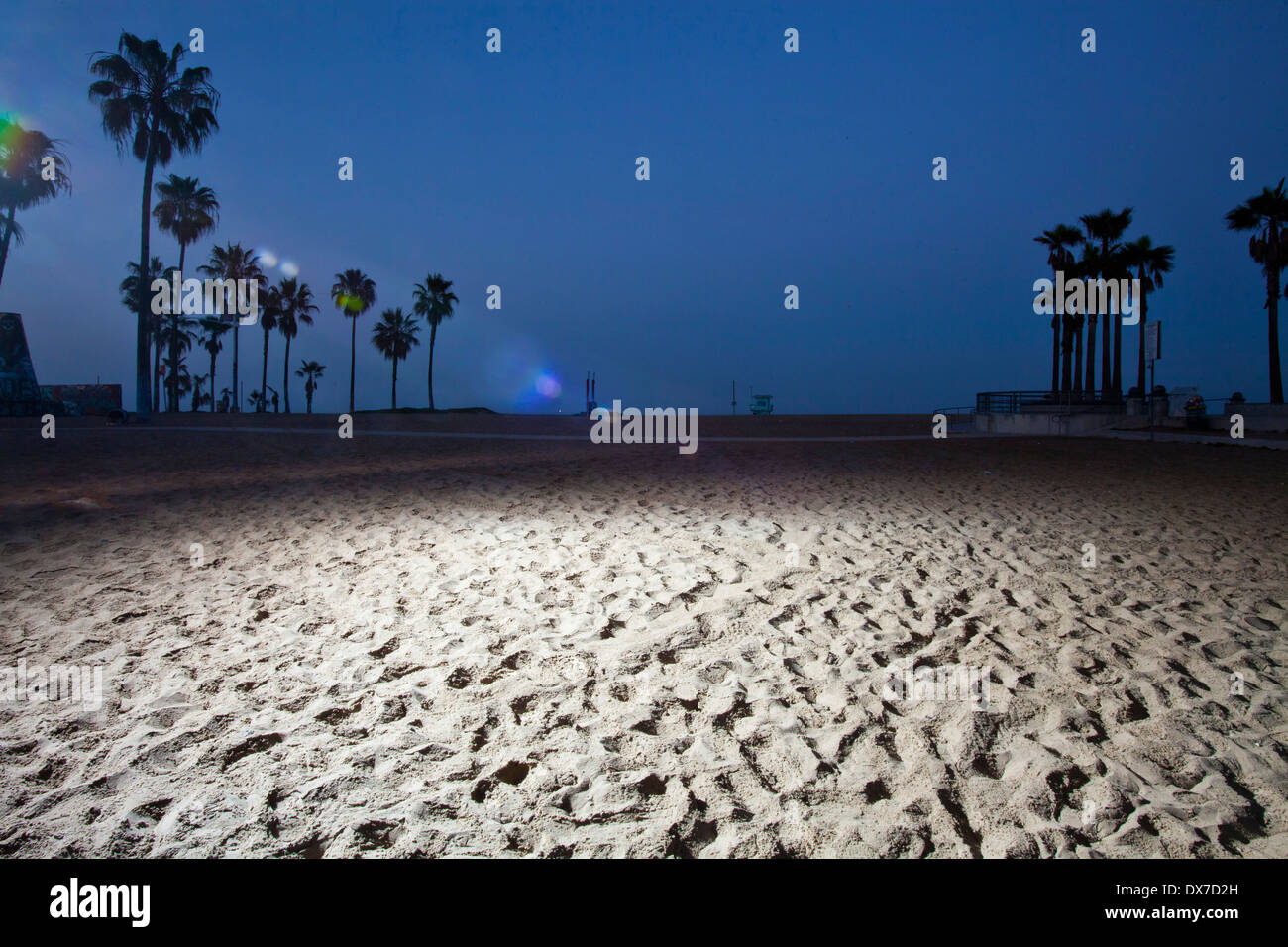 The beach illuminated by a spot light. Venice Beach, California, United States of America Stock