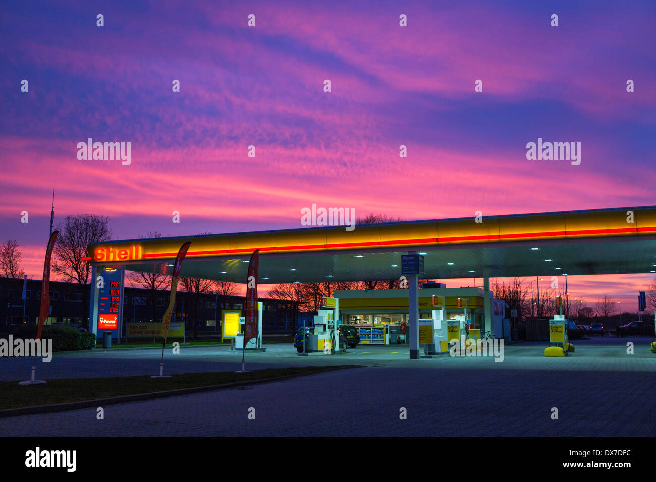 Shell filling station with afterglow sky in the Netherlands Stock Photo